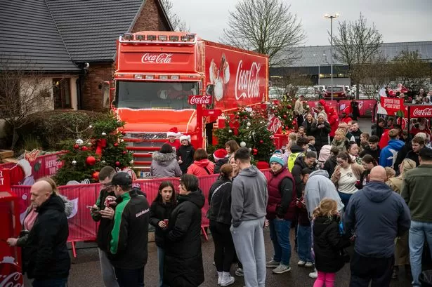 Huge snaking queue forms for Coca-Cola Christmas truck