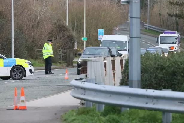 Woman dies and three people seriously injured in crash on major Welsh road