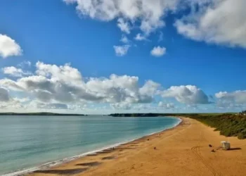 Warning to beachgoers after sewage flows into river near popular Welsh beach