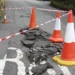 Road closed as large sinkhole opens up
