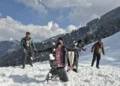 Snow-covered valleys of Kashmir revive tourist bookings