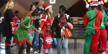 ‘North Pole’ flight takes kids to Santa in transformed Denver airport hangar