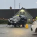 Car rescued by fire service after getting stuck on supermarket bollards