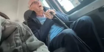 Beautiful moment man breaks into song on bus