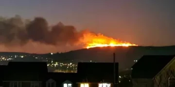Huge mountain fire seen for miles in Swansea