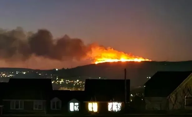 Huge mountain fire seen for miles in Swansea