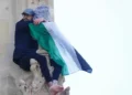 Man climbs Big Ben and drapes himself in Palestine flag as police shut Westminster Bridge