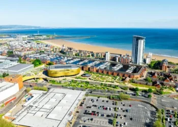 A Welsh city and a seaside town have been named among the best places to invest in the UK