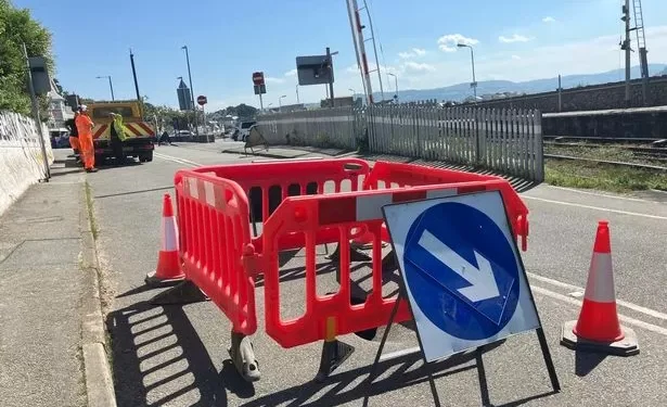 Pictures show the ‘large sinkhole’ that appeared at Welsh train station