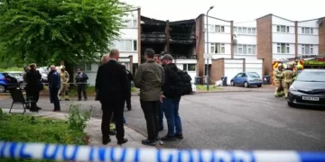 Man arrested on suspicion of murder as mum and her three children die in fire