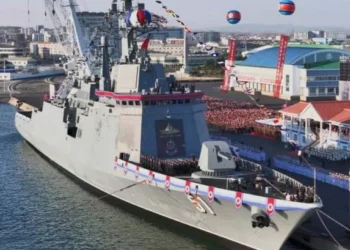 North Korea’s huge new warship sinks during launch in front of Kim Jong-un