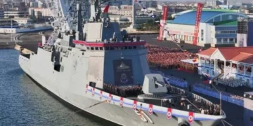 North Korea’s huge new warship sinks during launch in front of Kim Jong-un