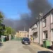 Residents told to keep windows and doors closed as smoke billows above town