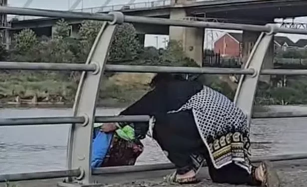 Investigation under way after woman seen chucking rubbish into river