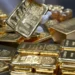 Gold heads south as dollar strengthens