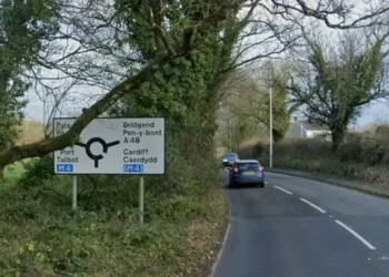 Crash involving car and motorcyclist shuts road for hours