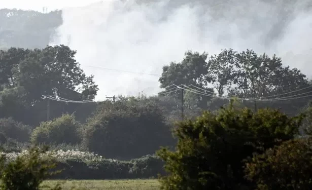 Fire crews tackle large blaze that can be seen from miles away