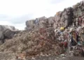 More than 1,800 tonnes of waste illegally dumped by one man and his firms across Wales