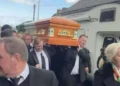 City brought to halt as thousands attend traveller’s funeral with Rolls Royce cortege and flypast