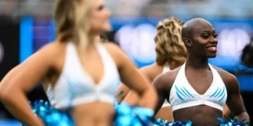 NFL’s First Transgender Cheerleader Says Panthers Fired Him Because He Is Trans