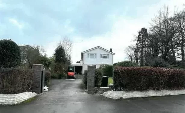 Family ordered to take down their front garden fence