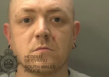 Armed man caught on camera in horrifying racist tirade