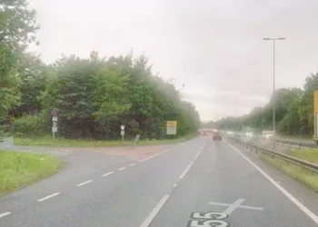 Two injured after car crashes and hits trees on major Welsh road
