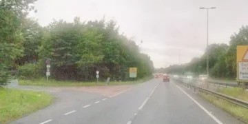 Two injured after car crashes and hits trees on major Welsh road