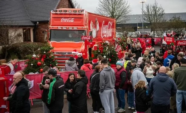 Huge snaking queue forms for Coca-Cola Christmas truck