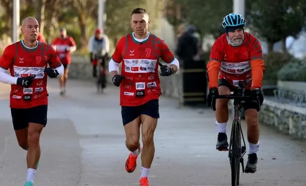 Kevin Sinfield says ‘together we’ll crack this’ as he runs through city in memory of Rob Burrow