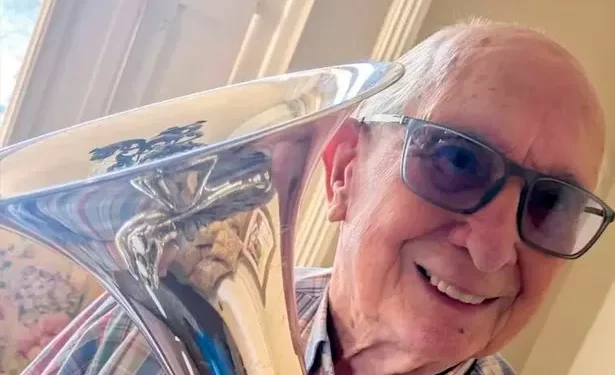 Trumpet player, 95, still going strong in the band he’s been in for 87 years