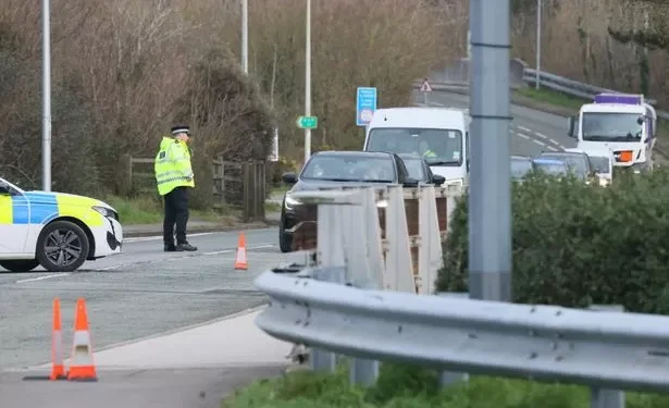 Woman dies and three people seriously injured in crash on major Welsh road