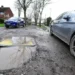 Elderly woman dies after falling into pothole