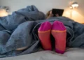 Disgusting reason you should stop wearing socks to bed – even if you’re cold