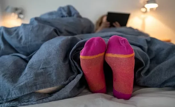 Disgusting reason you should stop wearing socks to bed – even if you’re cold